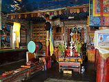 18 Inside Tashi Lhakhang Gompa In Phu With Statue Of Padmasambhava, Drum, Masks and Books